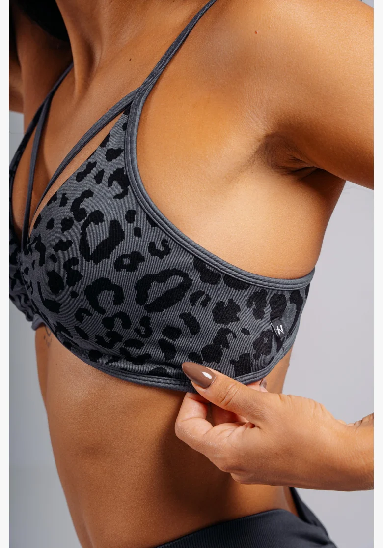NEBBIA Reggiseno sportivo a sostegno medio con motivo leopardato PRIMAL nero
