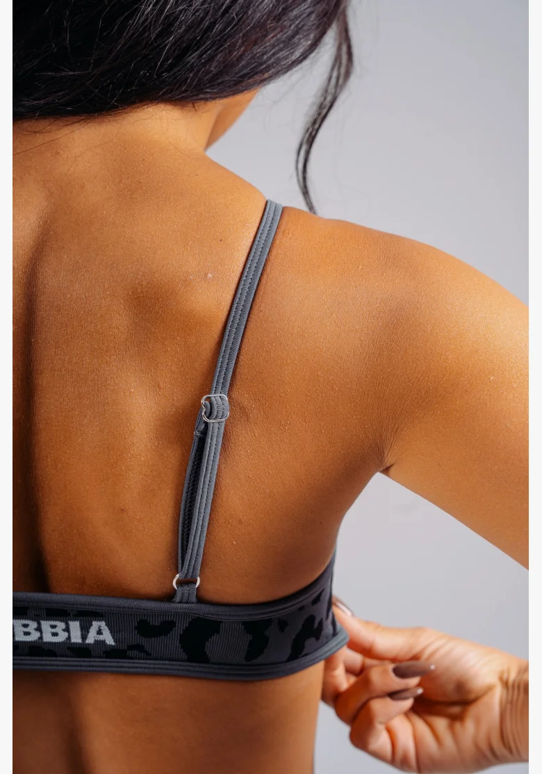NEBBIA Reggiseno sportivo a sostegno medio con motivo leopardato PRIMAL nero