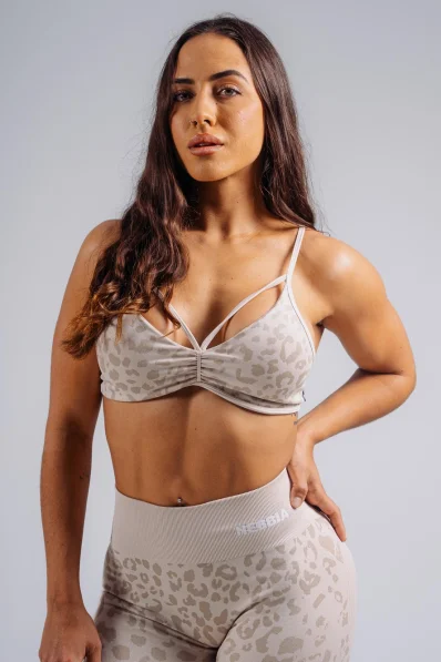 NEBBIA reggiseno sportivo a sostegno medio con motivo leopardato PRIMAL crema