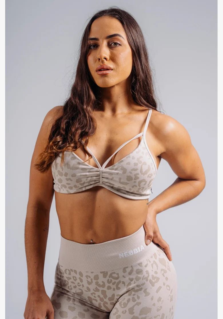 NEBBIA reggiseno sportivo a sostegno medio con motivo leopardato PRIMAL crema