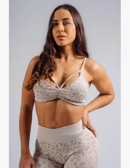 NEBBIA reggiseno sportivo a sostegno medio con motivo leopardato PRIMAL crema