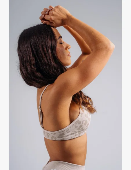 NEBBIA reggiseno sportivo a sostegno medio con motivo leopardato PRIMAL crema