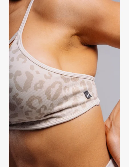 NEBBIA reggiseno sportivo a sostegno medio con motivo leopardato PRIMAL crema