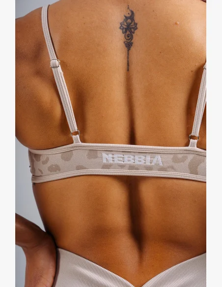 NEBBIA reggiseno sportivo a sostegno medio con motivo leopardato PRIMAL crema