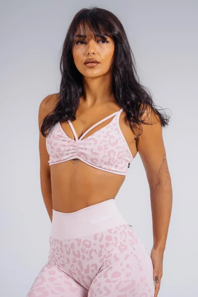 NEBBIA reggiseno sportivo a sostegno medio con motivo leopardato PRIMAL rosa
