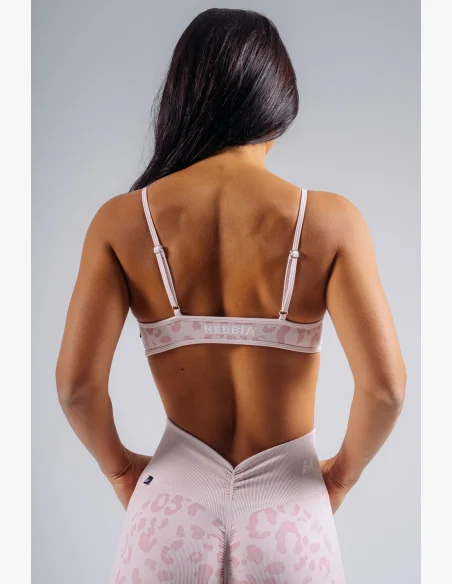 NEBBIA reggiseno sportivo a sostegno medio con motivo leopardato PRIMAL rosa