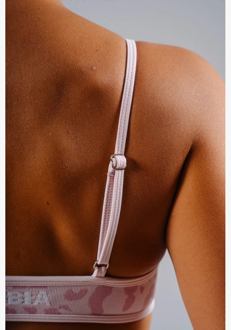 NEBBIA reggiseno sportivo a sostegno medio con motivo leopardato PRIMAL rosa