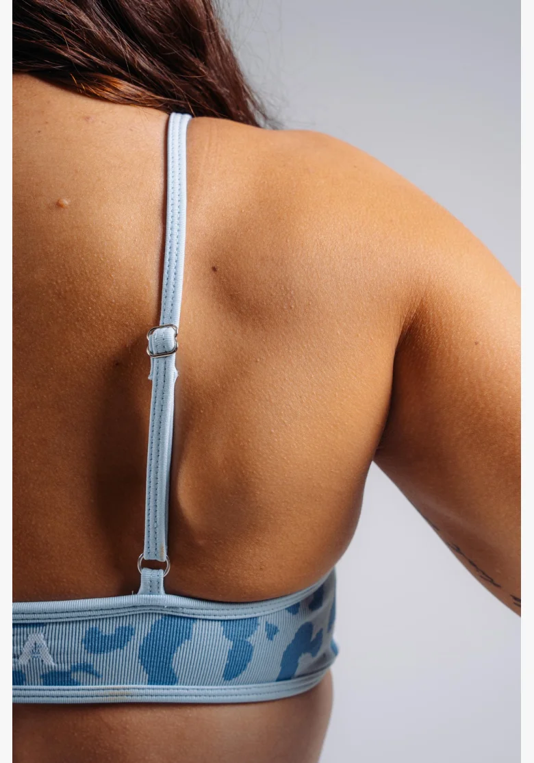NEBBIA reggiseno sportivo a sostegno medio con motivo leopardato PRIMAL blu