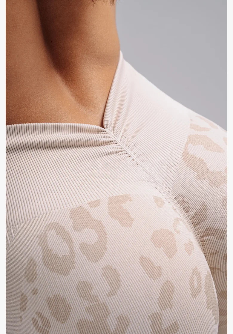 NEBBIA pantaloncini push-up compressivi con motivo leopardato PRIMAL crema