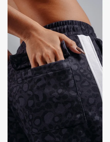 NEBBIA pantaloni larghi con motivo leopardato PRIMAL neri