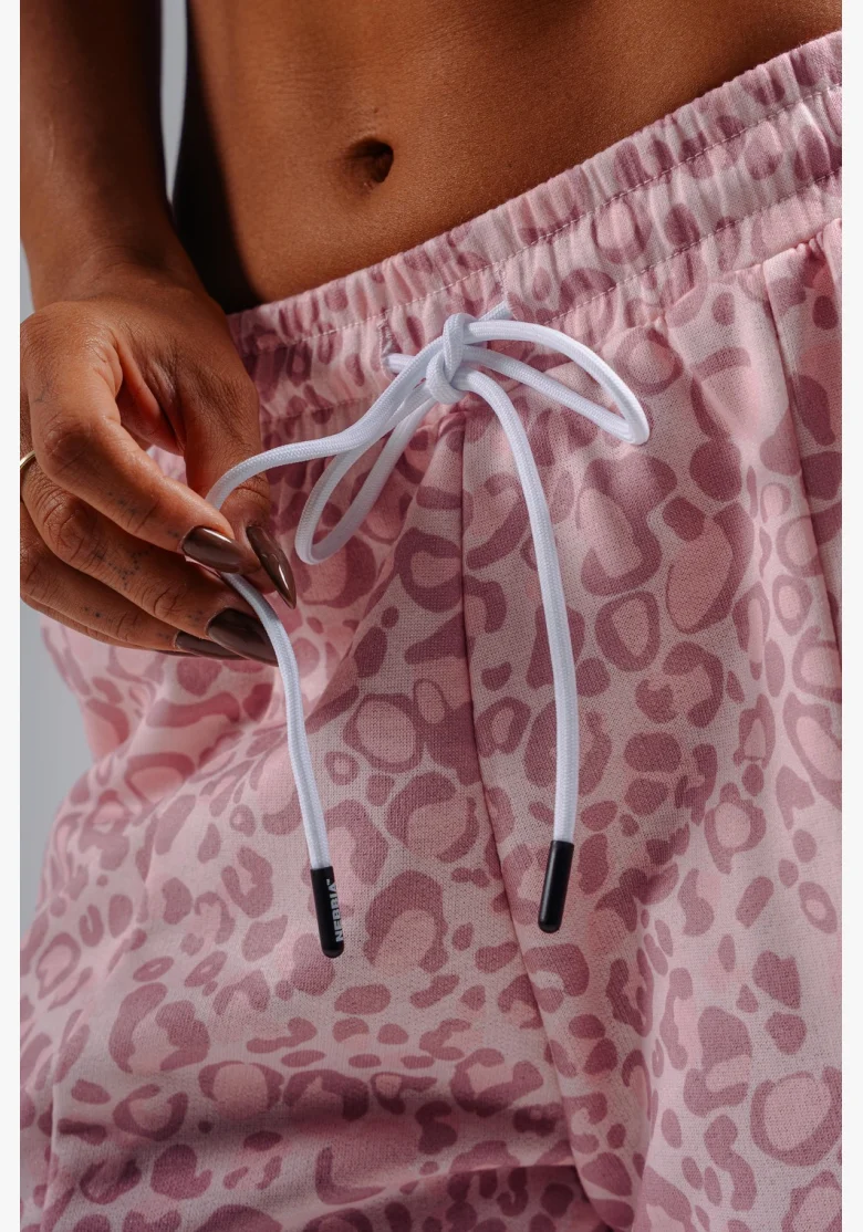 NEBBIA pantaloni larghi con motivo leopardato PRIMAL rosa