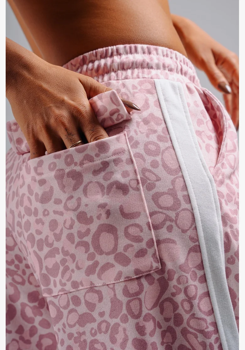 NEBBIA pantaloni larghi con motivo leopardato PRIMAL rosa