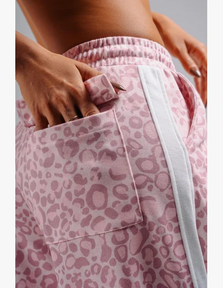 NEBBIA pantaloni larghi con motivo leopardato PRIMAL rosa