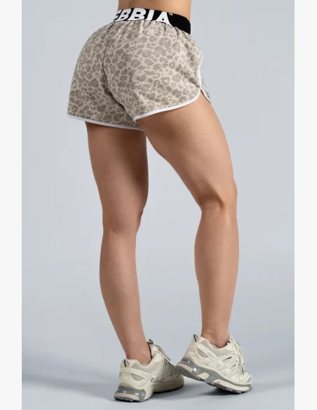 NEBBIA pantaloncini da allenamento con motivo leopardato PRIMAL crema