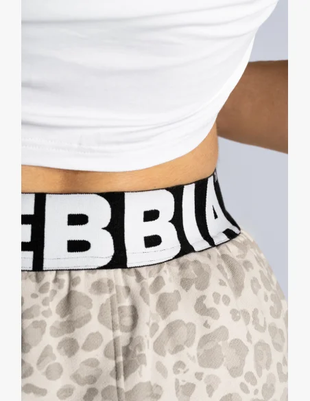 NEBBIA pantaloncini da allenamento con motivo leopardato PRIMAL crema