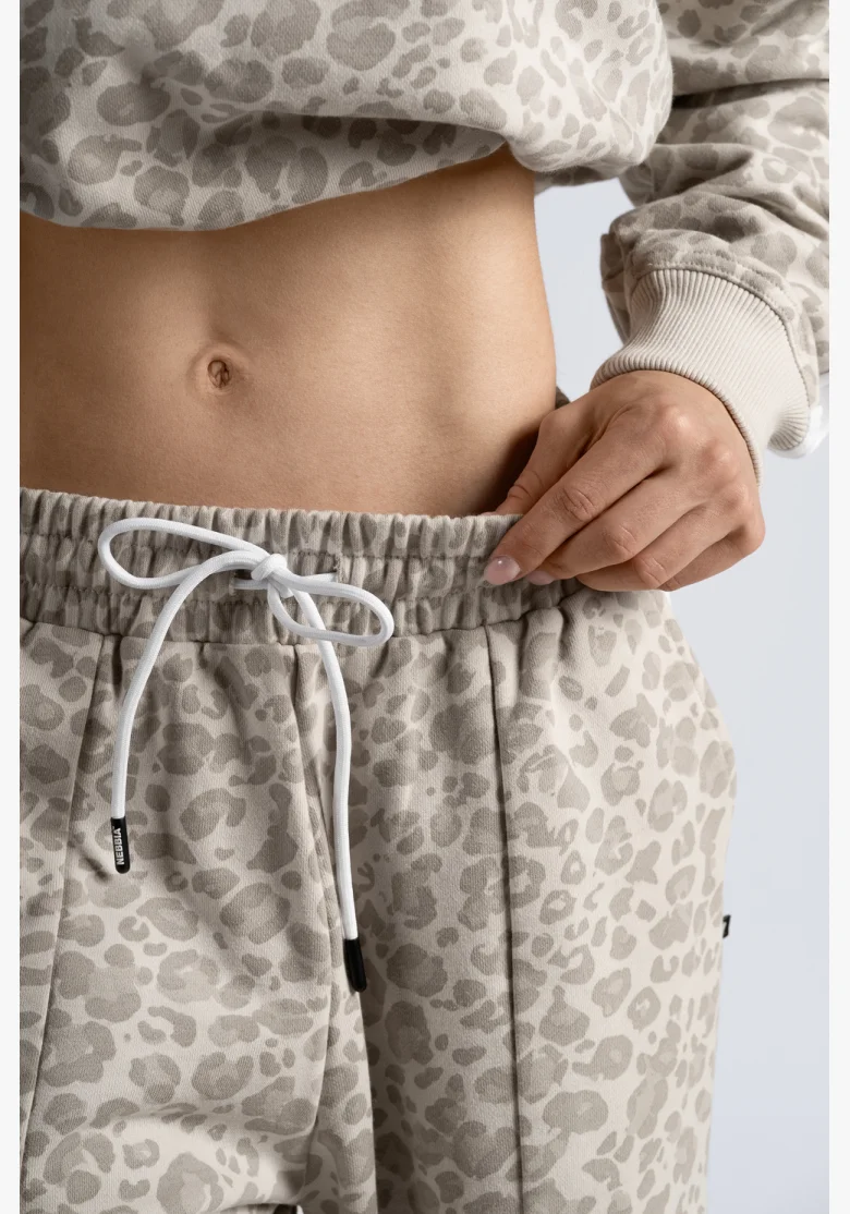 NEBBIA pantaloni larghi con motivo leopardato PRIMAL color crema