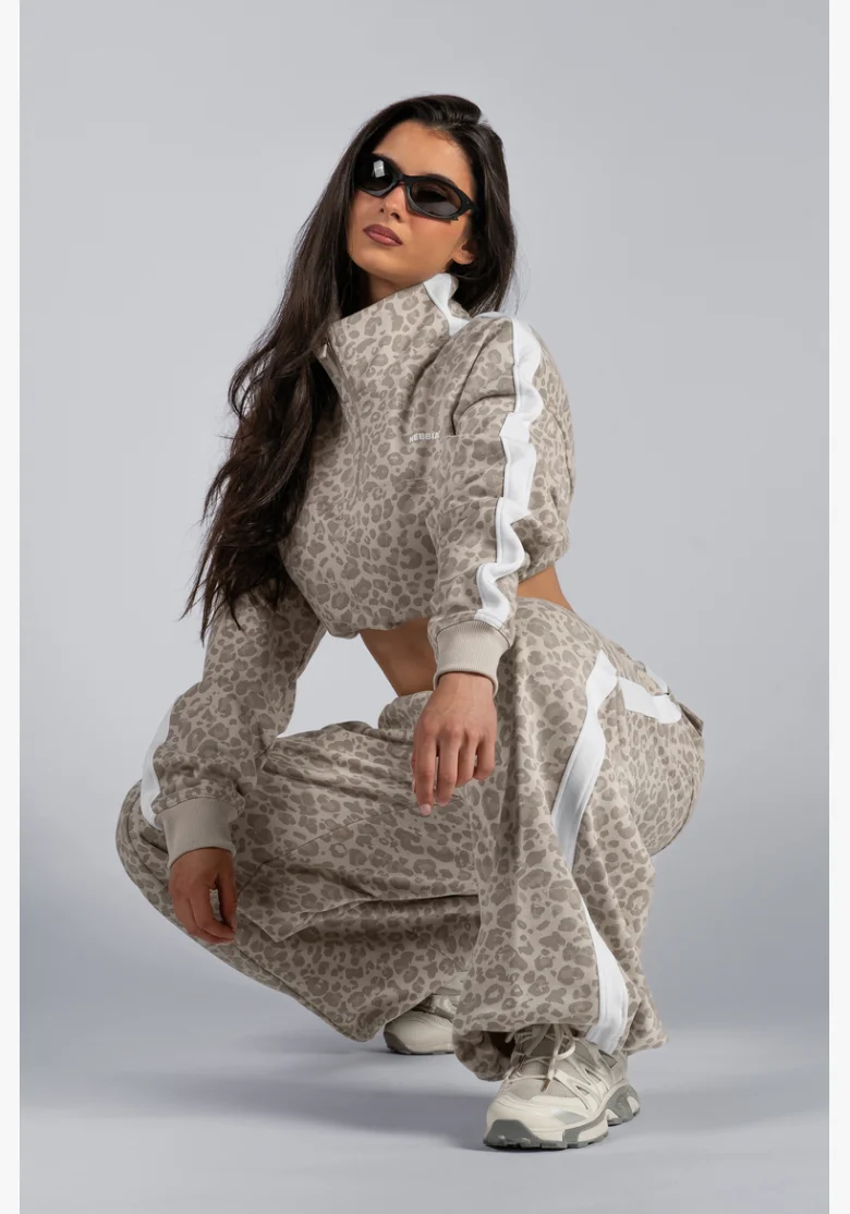 NEBBIA pantaloni larghi con motivo leopardato PRIMAL color crema
