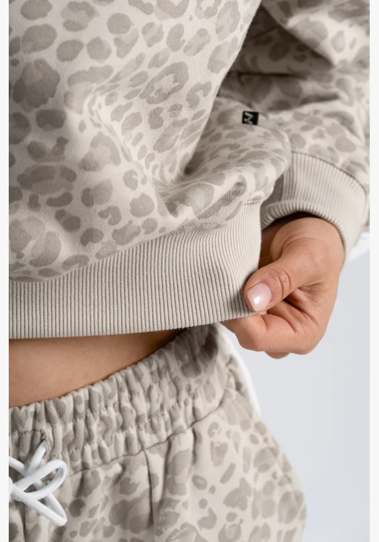 NEBBIA Felpa half-zip con motivo leopardato PRIMAL crema