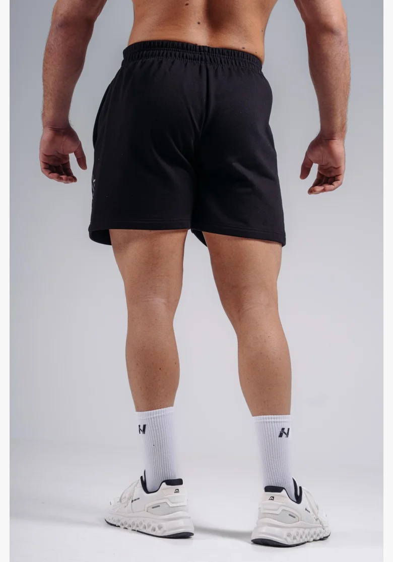 NEBBIA pantaloncini da allenamento oversize PRIMAL neri