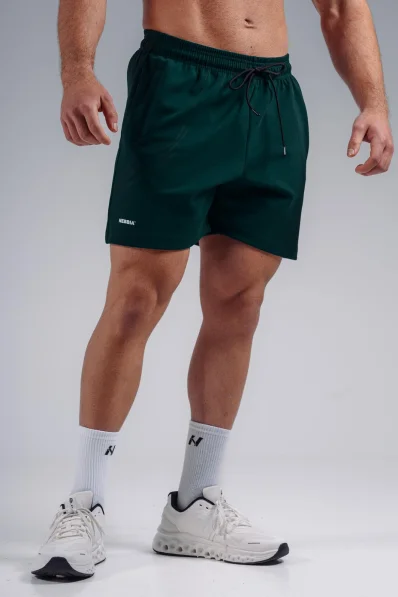 NEBBIA pantaloncini da allenamento oversize PRIMAL verdi