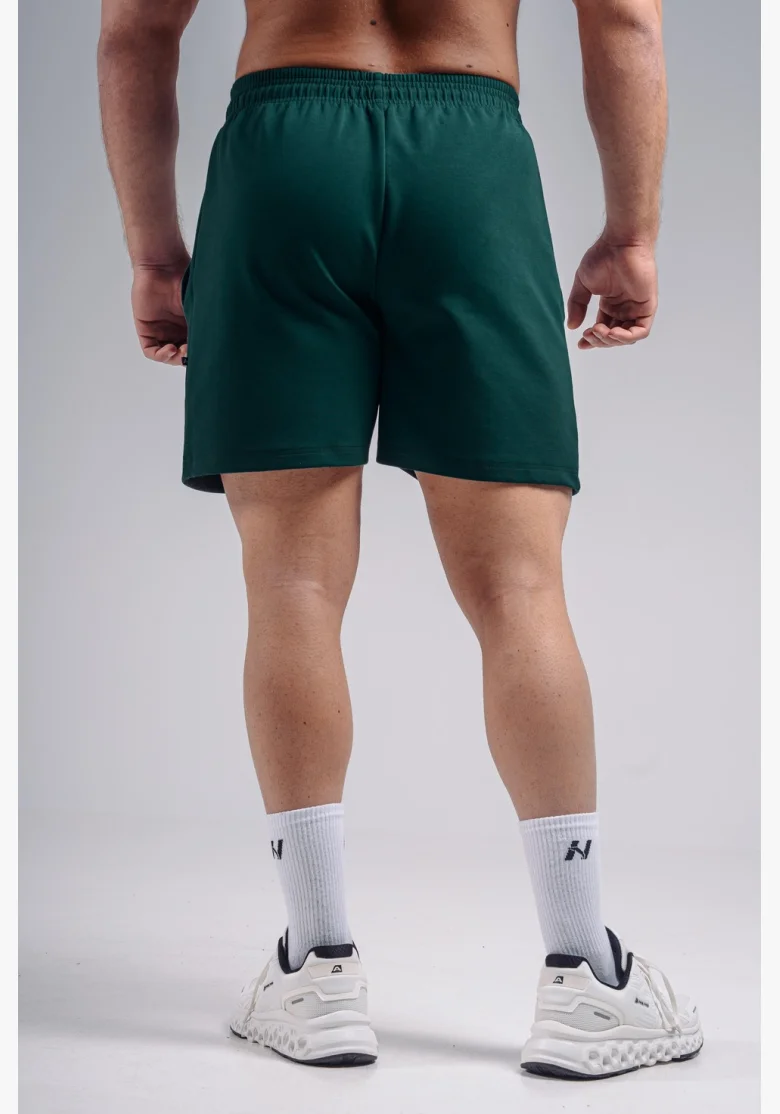 NEBBIA pantaloncini da allenamento oversize PRIMAL verdi