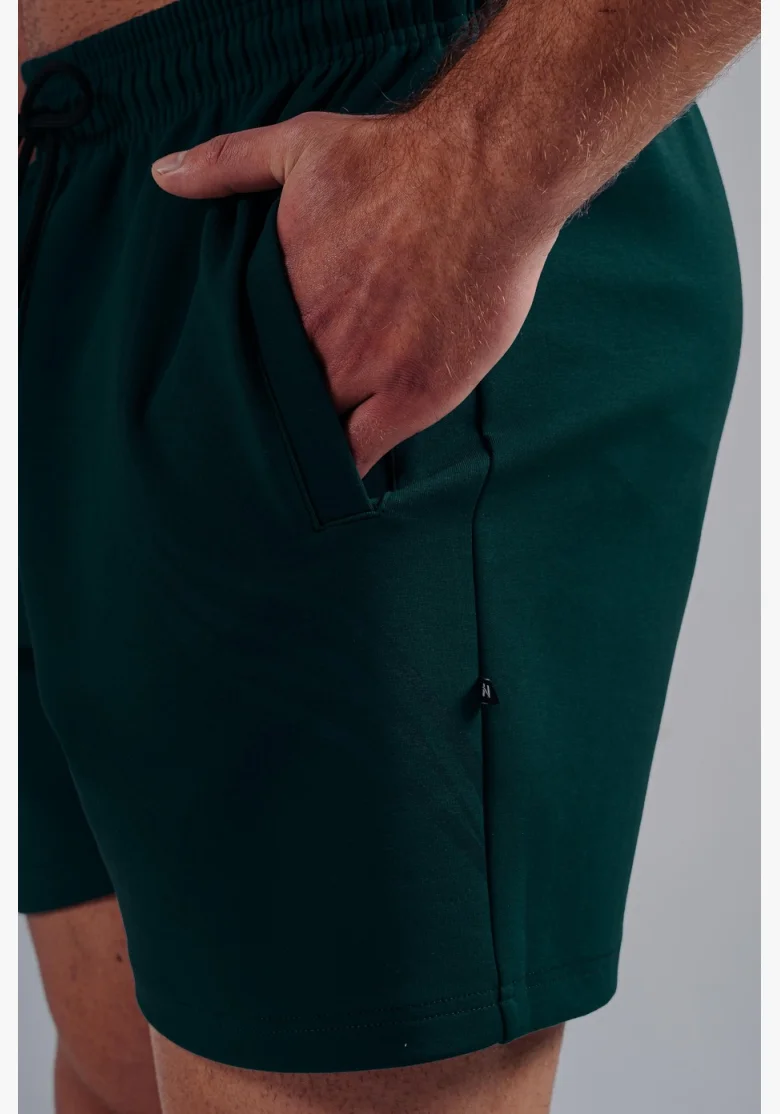 NEBBIA pantaloncini da allenamento oversize PRIMAL verdi