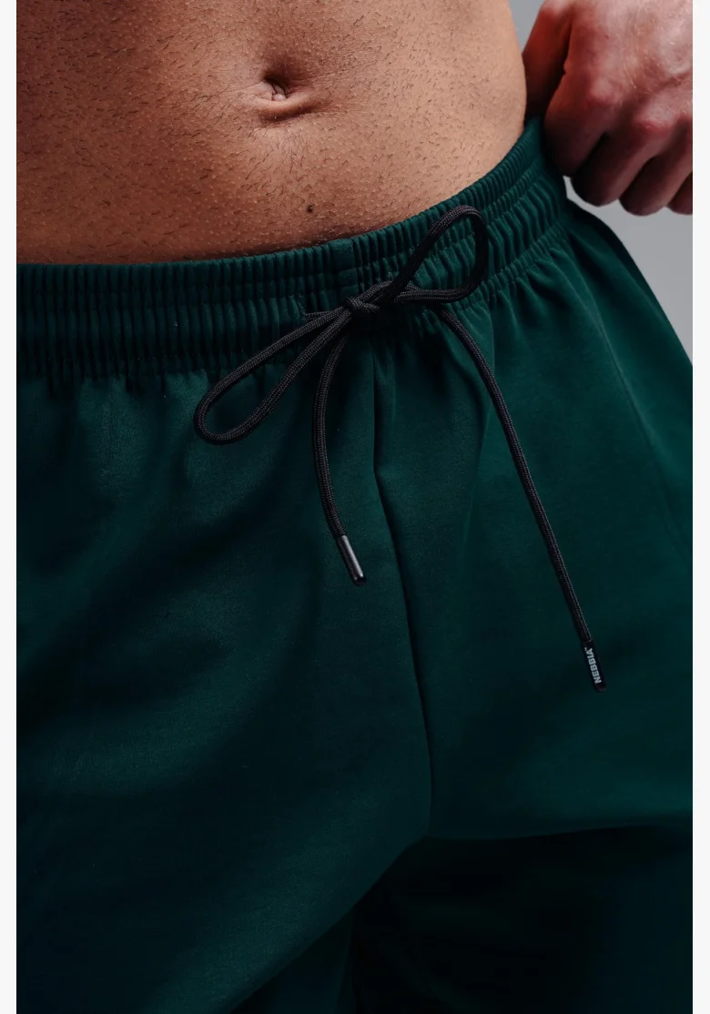 NEBBIA pantaloncini da allenamento oversize PRIMAL verdi
