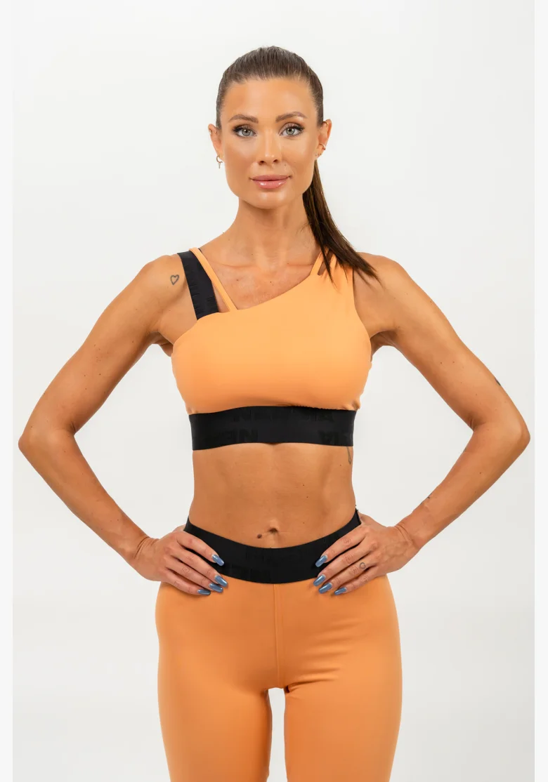 NEBBIA • Reggiseno sportivo asimmetrico ELITE arancione • Nebshop.cz