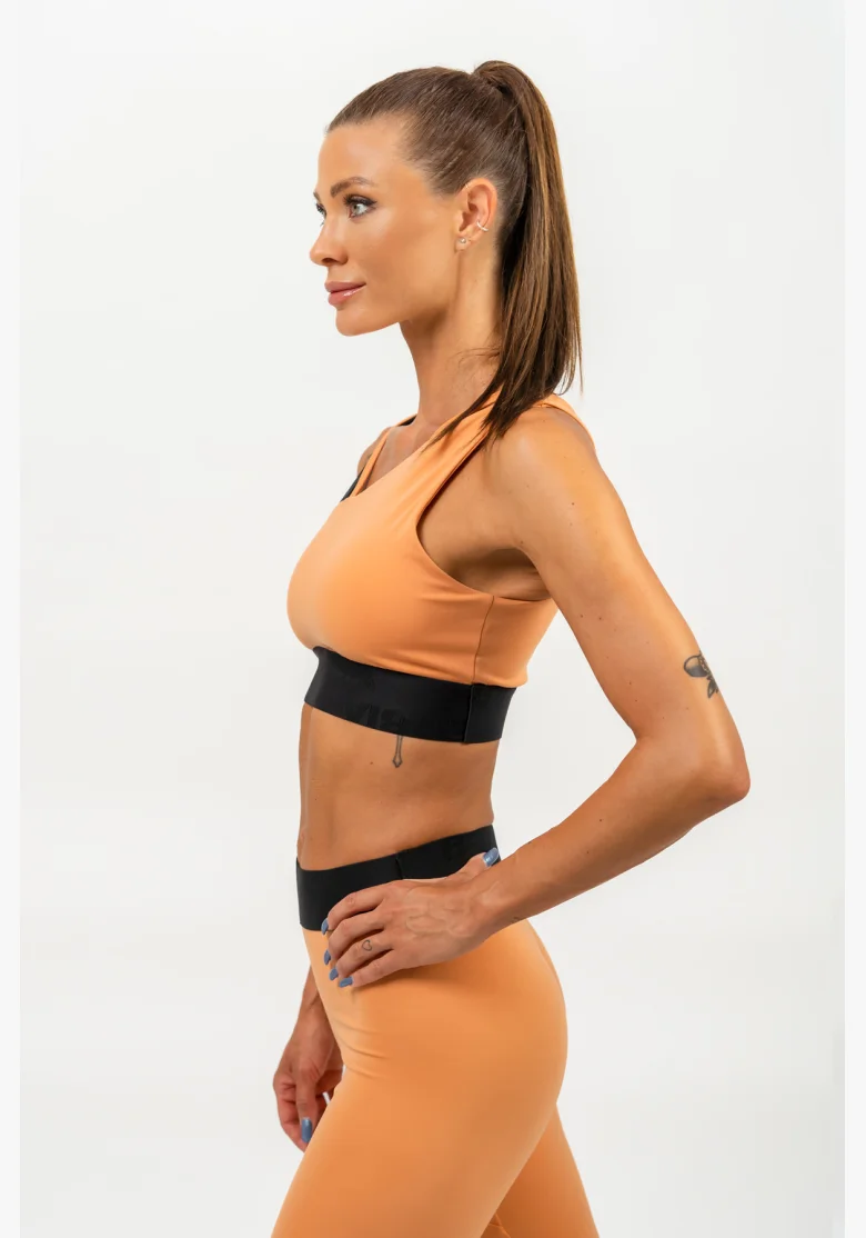 NEBBIA • Reggiseno sportivo asimmetrico ELITE arancione • Nebshop.cz