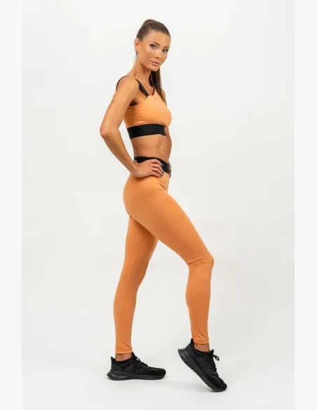 NEBBIA • Reggiseno sportivo asimmetrico ELITE arancione • Nebshop.cz