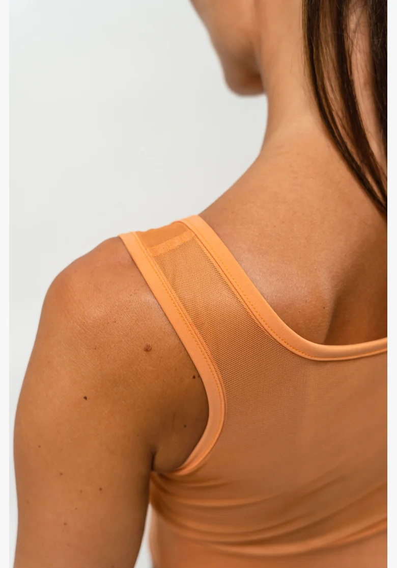 NEBBIA • Reggiseno sportivo con rete PERFORMANCE arancione • Nebshop.it