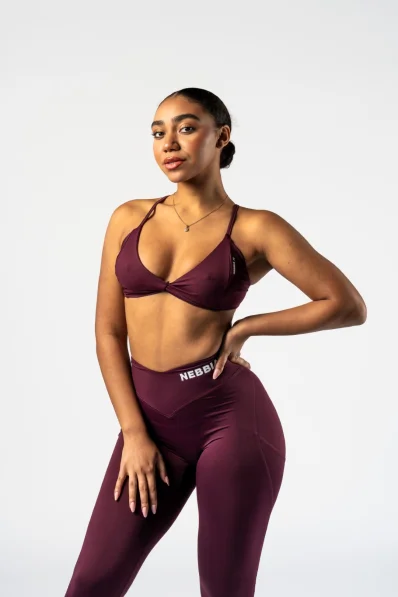 NEBBIA • NEBBIA Reggiseno sportivo con supporto medio TWIST-KNOT bordeaux • Nebshop.cz